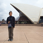 Rae outside the entrance to the Sydney Opera House.