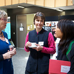 Rae speaks with conference organizer Tamara Jacka and Carolyn Brewer from ANU.